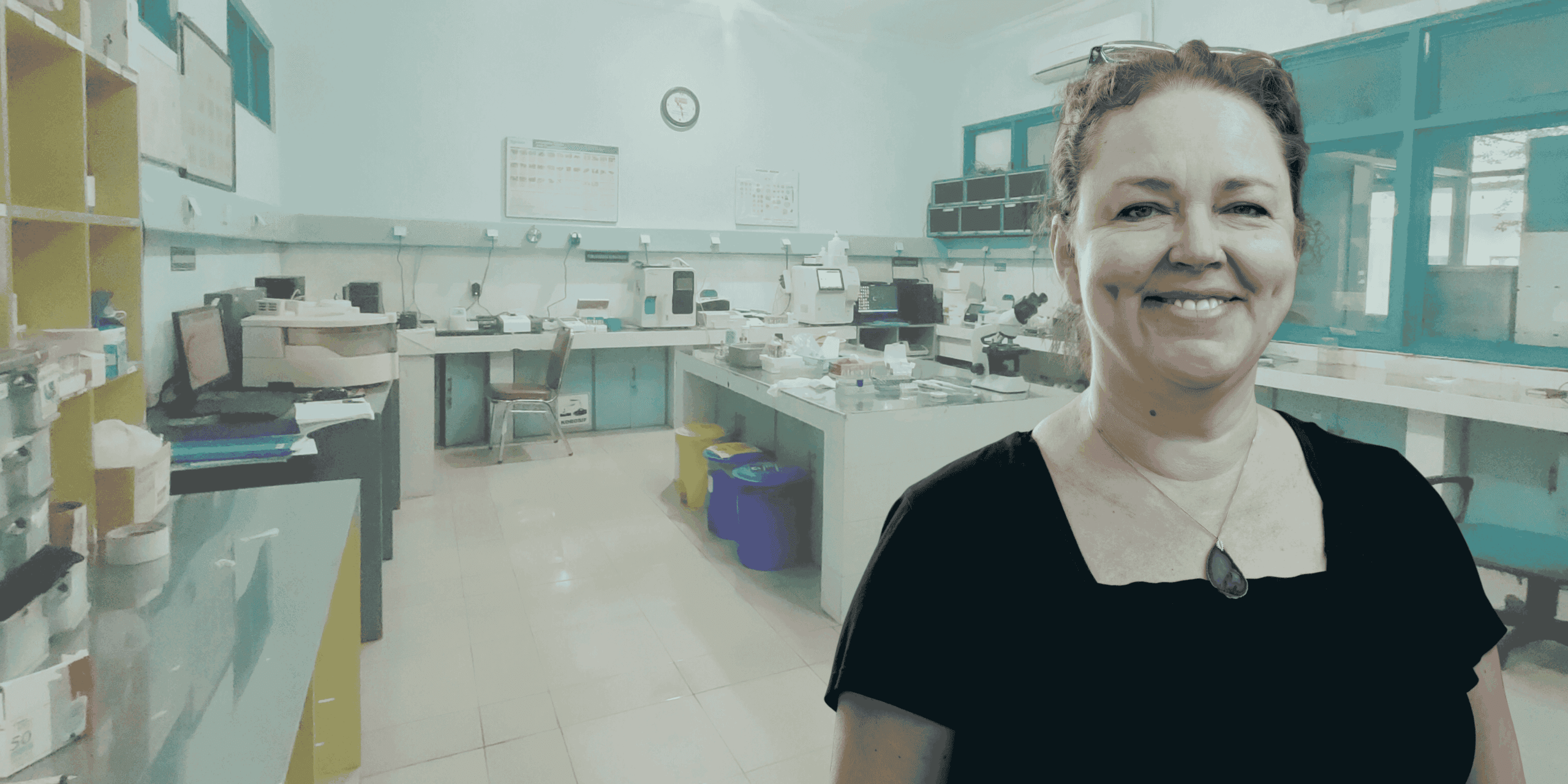 A headshot of Branka Vulesevic superimposed over an image of a research lab with a teal tint.